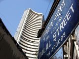 Indian shares slump as oil climbs above $104